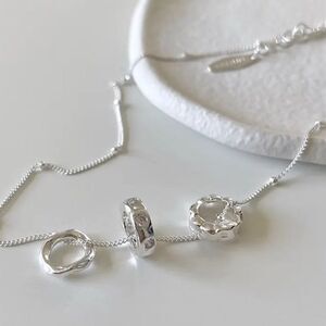 The Trio Ring Pendant Necklace in 925 silver
